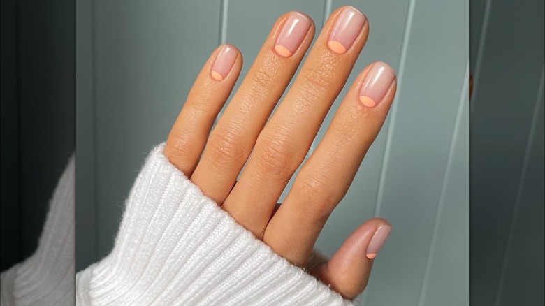 Reverse French tips peach nails