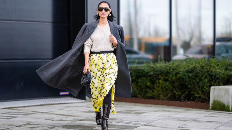 Woman in yellow flowery spring skirt 