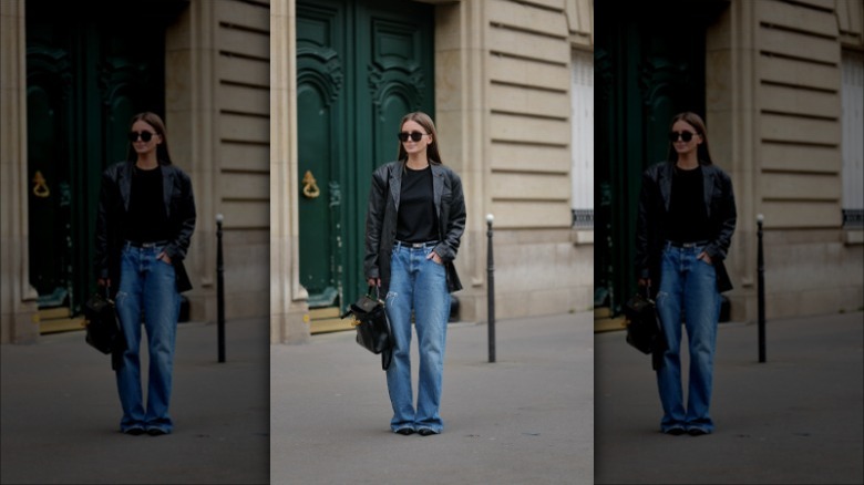 woman wearing black shirt and jeans