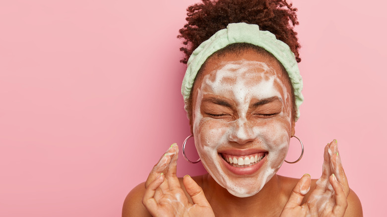 woman washing face