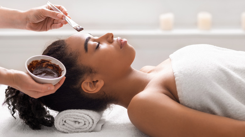 Woman getting a spa facial