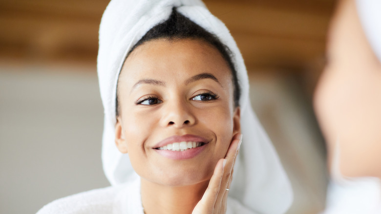 Woman smiling in the mirror