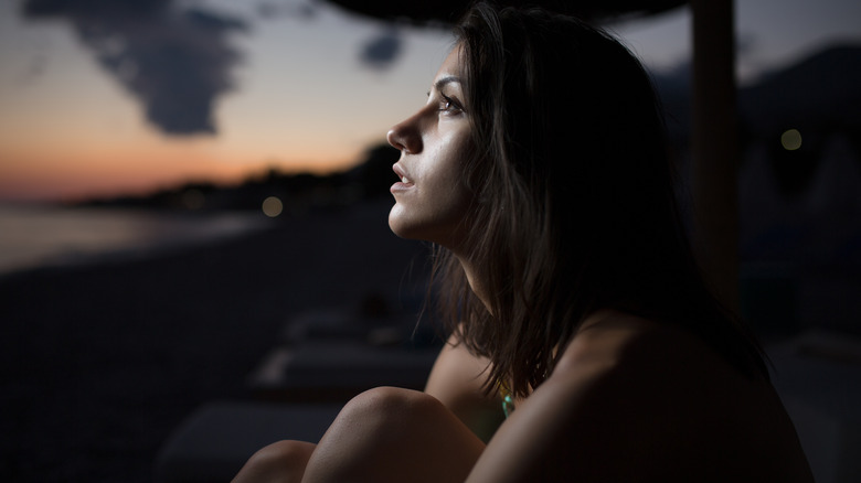 woman gazing at stars