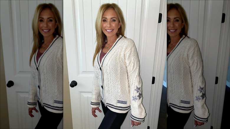 Woman wearing "Folklore" cardigan