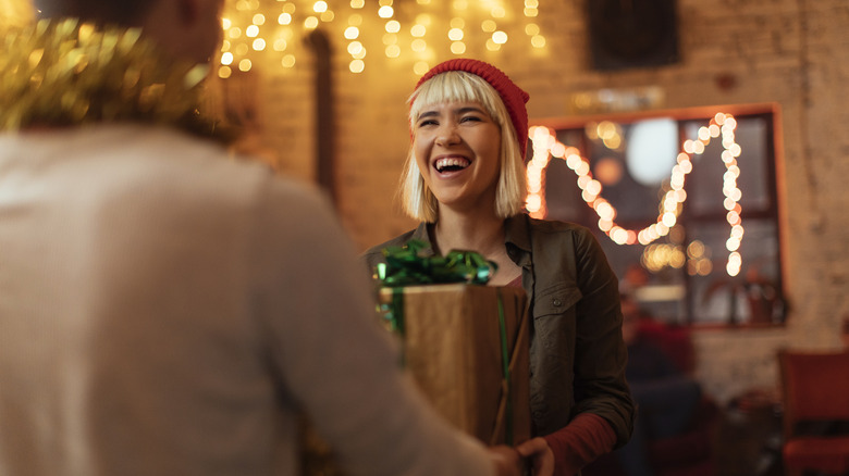 Woman receiving xmas gifts