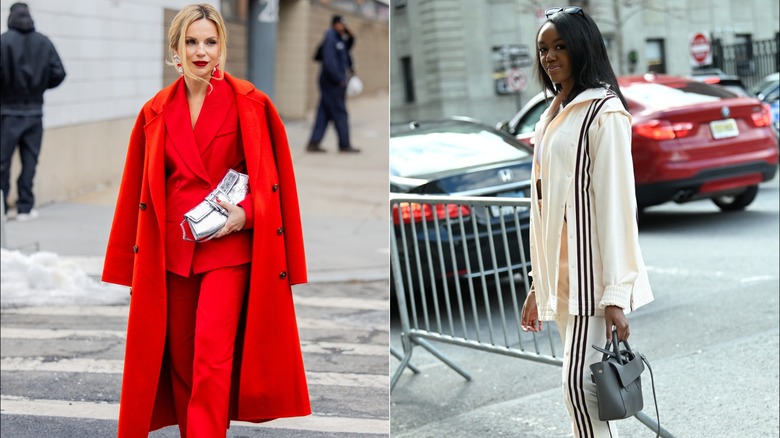 A woman in a crimson suit and coat next to a woman in cream Adidas athleisure.