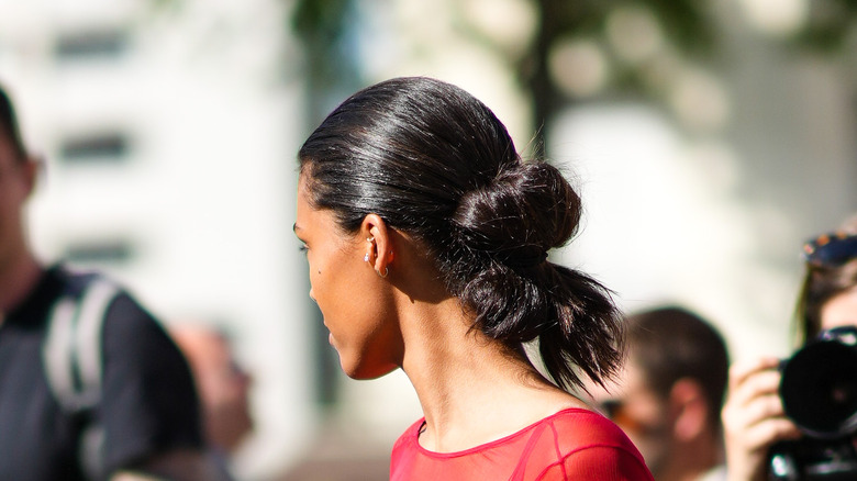 woman wearing slick flipped bun