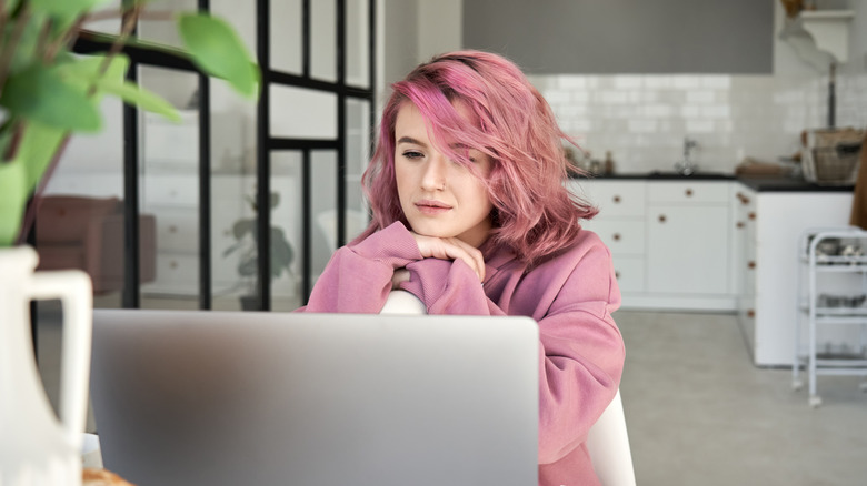 Woman researching on laptop 