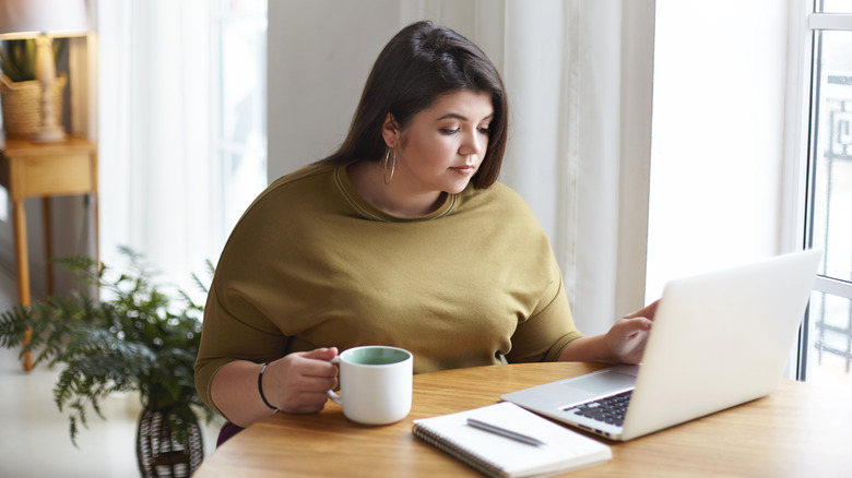 Woman looking at computer