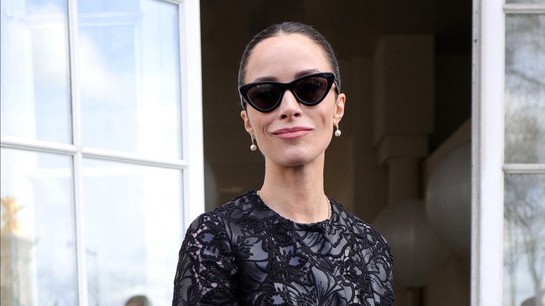 Woman wearing cat-eye shaped glasses