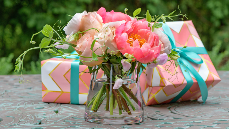 Presents and a vase of flowers 