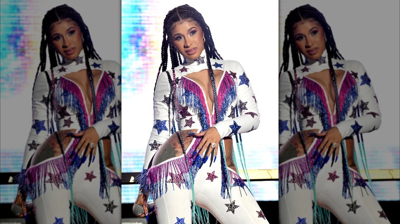 Cardi B in fringed jumpsuit