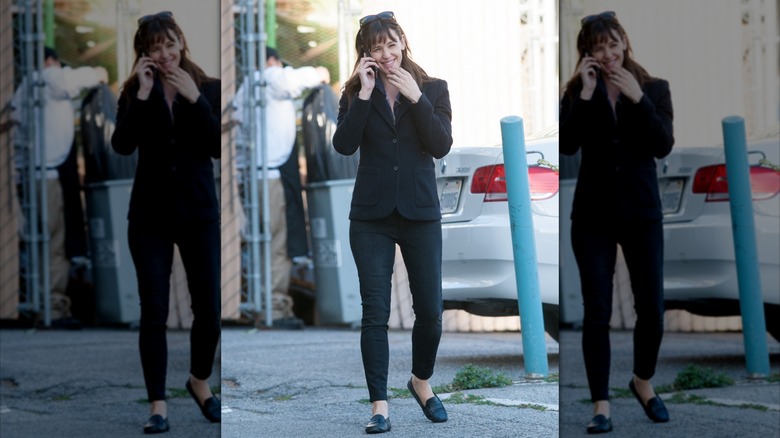 Jennifer Garner wearing flats and a blazer.