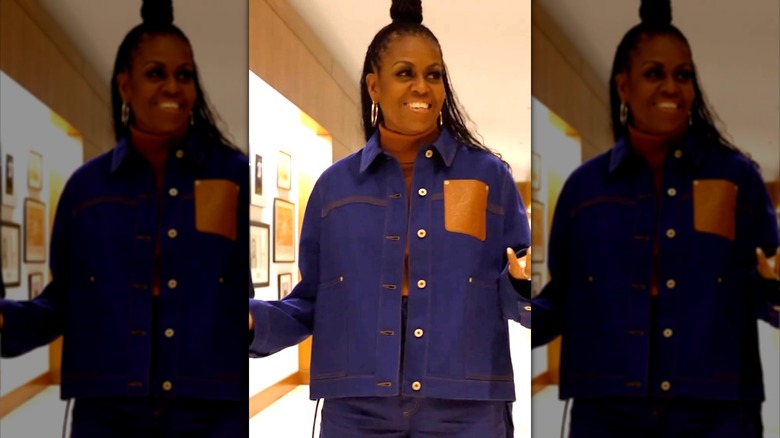 Smiling Michelle Obama in denim jacket