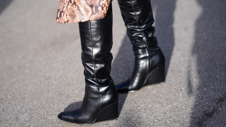 Black knee-high wedge-heel boots