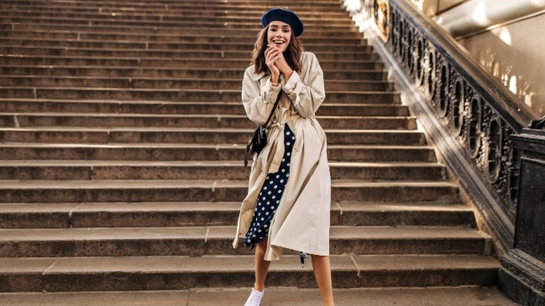 woman wearing beige trench coat