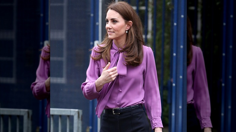 Kate Middleton wearing purple Gucci blouse