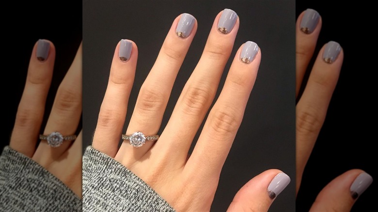 Glossy gray manicure with crescent gold