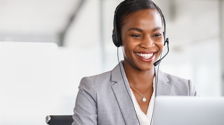 Woman at work, smiling