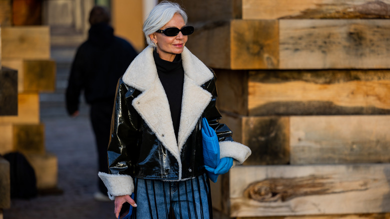 Woman with matching gloves and bag