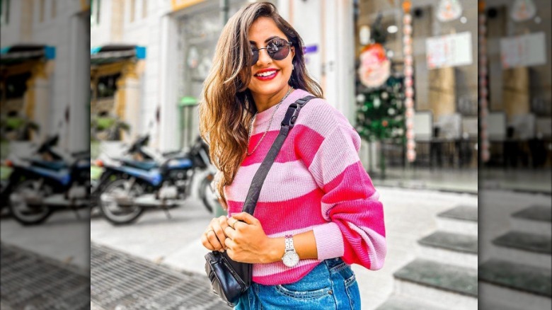 Woman wearing vibrant pink lipstick 