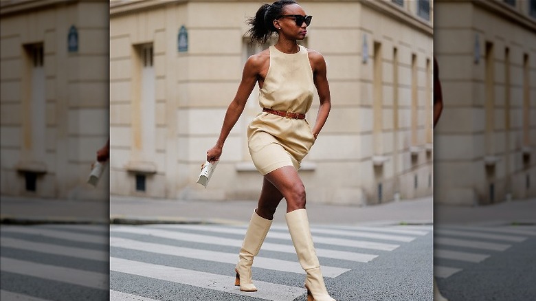 woman walking with yellow dress