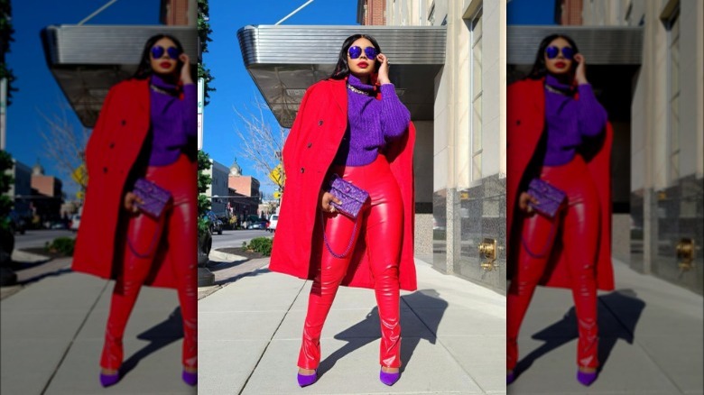 woman wearing purple sweater red suit