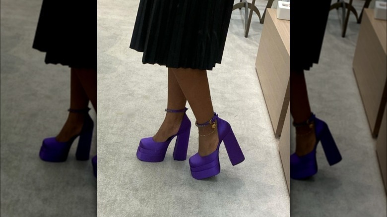 woman wearing purple high heels