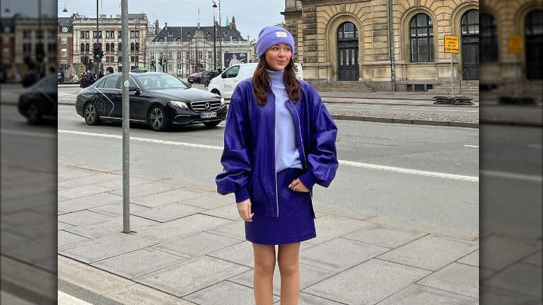 woman wearing purple outfit
