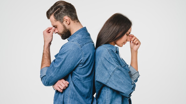 Couple frustrated back-to-back