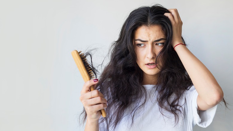 Woman losing hair 