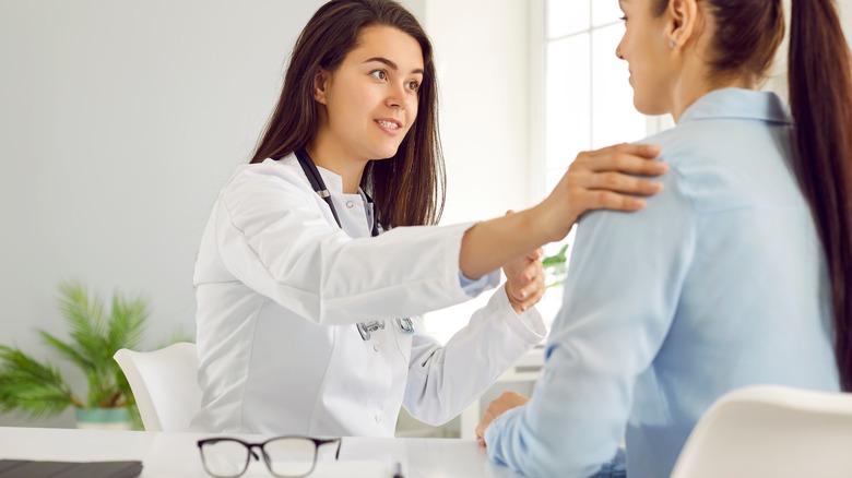 Woman talking to her doctor 