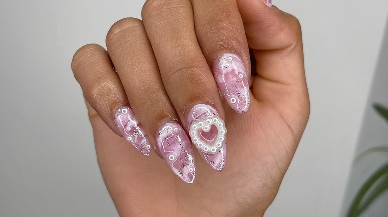 Pearl heart nail design