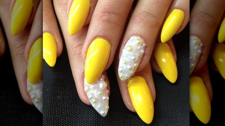 Yellow, white manicure, pearl details