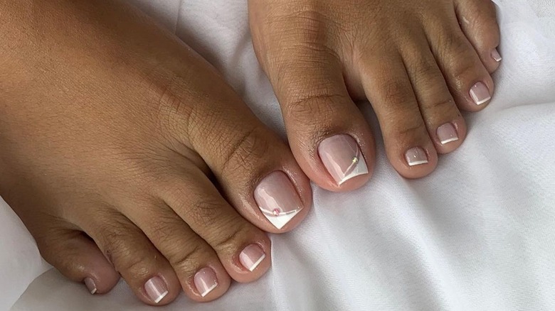 Woman with a diagonal French tip