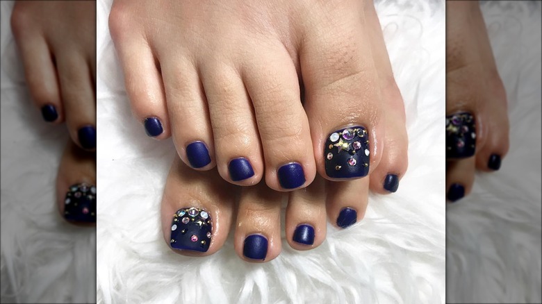 Woman with rhinestone pedicure