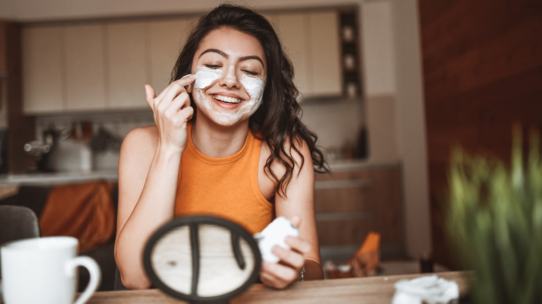 Woman applying products