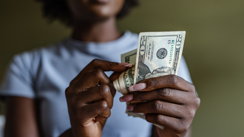 Woman counting money