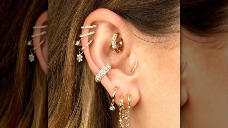 multiple stacked earrings