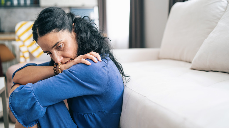 anxious woman at home