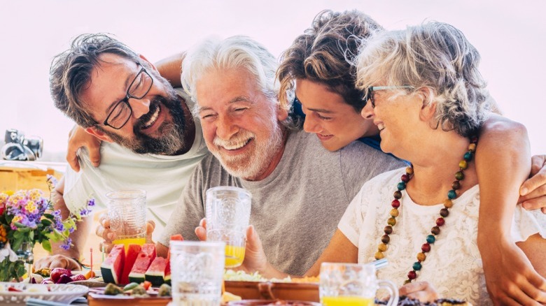 Older adults at outdoor dinner party