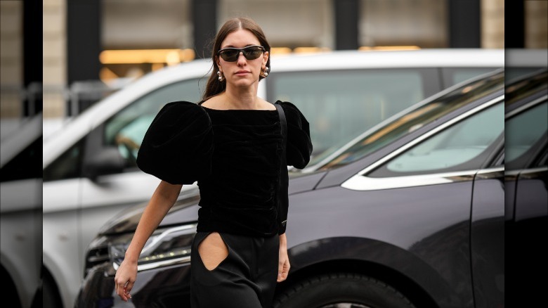 woman wearing black velvet blouse