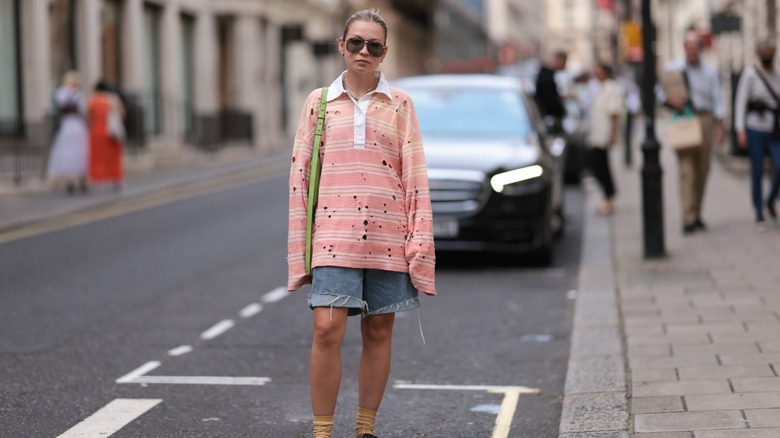 woman wearing rugby shirt 