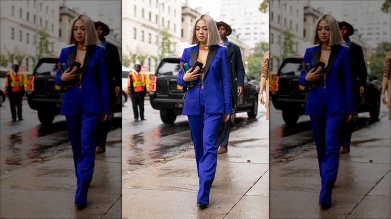 woman in cobalt pantsuit