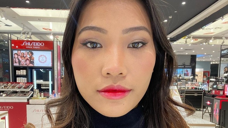 Girl wearing bright lipstick