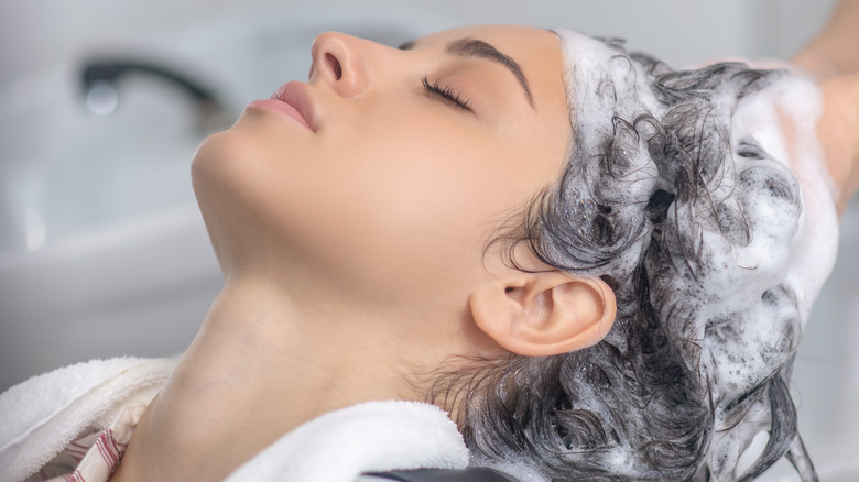 woman getting hair washed