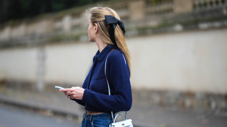 woman wearing ribbon hair bow