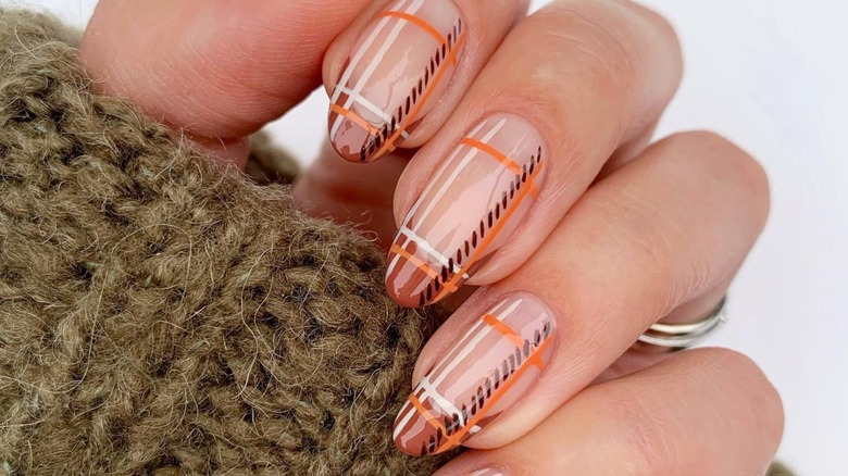 brown and orange plaid nails