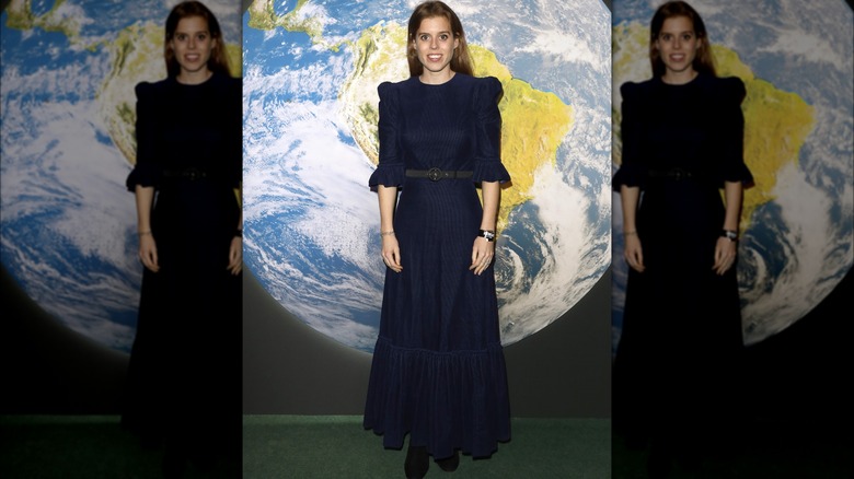 Princess Beatrice wearing a navy dress