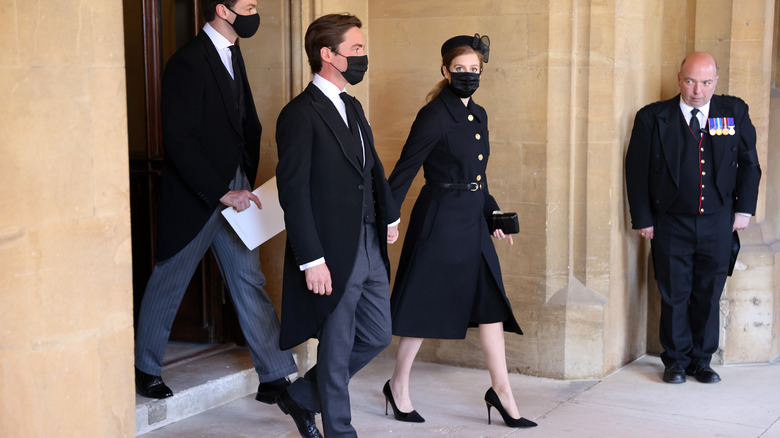 Princess Beatrice walking and wearing mask